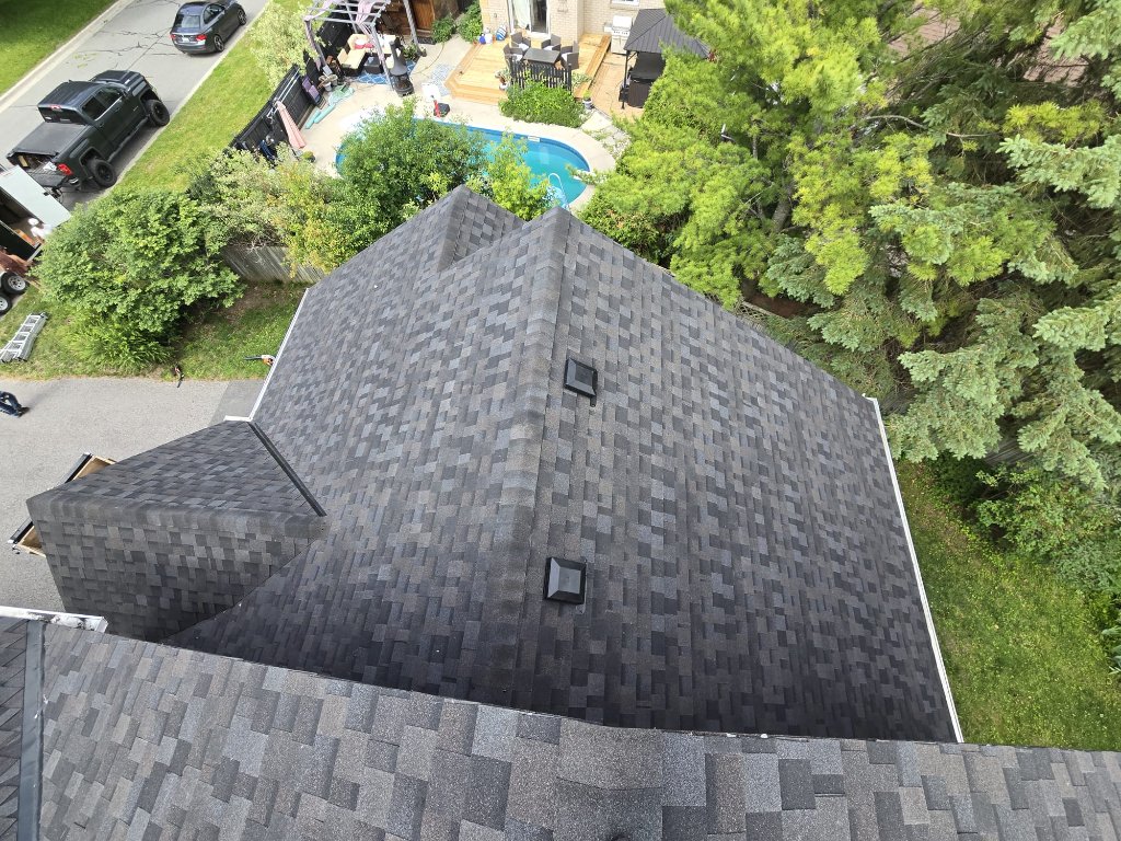 Aerial overview of completed residential roof replacement with dimensional shingles and vent installation by 905 Roofing Inc. in Durham Region and the GTA